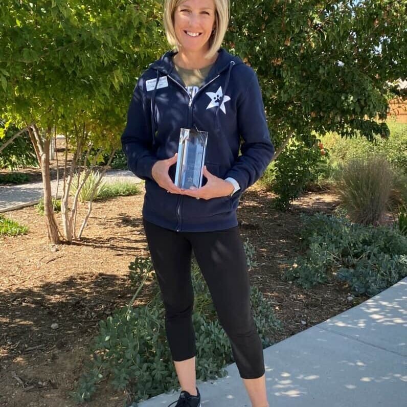charlene-with-award-796x1024-1